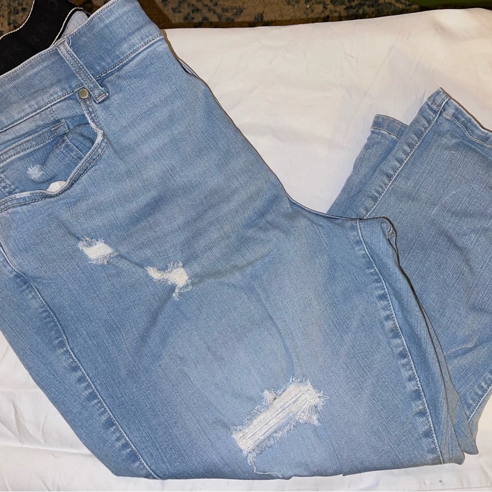 *** SOLD *** Torrid distressed crops.  Light blue.  Size 24